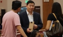 (Photo : )Pastor Andrew Park speaks  with hismembers of his congregation