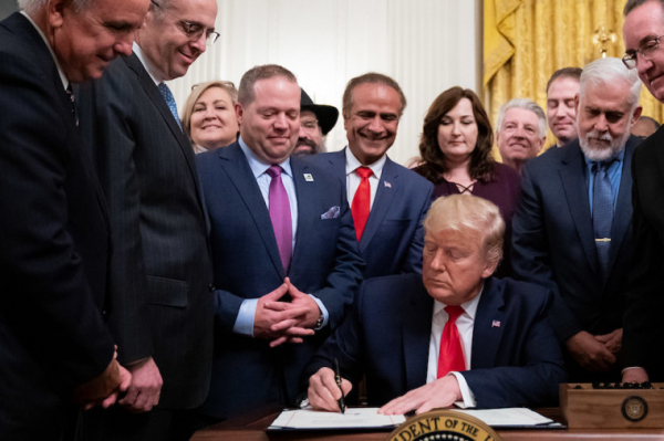 President Donald J. Trump signs H.R. 2476 on Friday, Jan. 24, 2020, in the East Room of the White House.