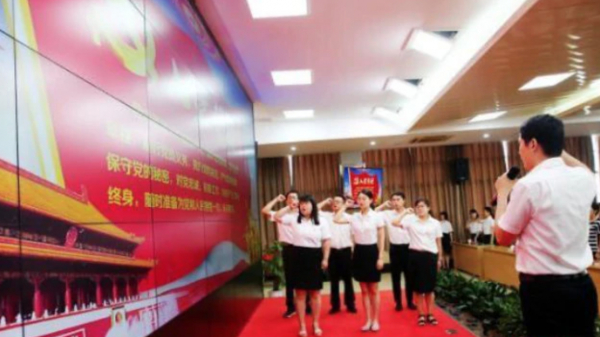 Chinese Teachers swearing allegiance to the Communist Party.