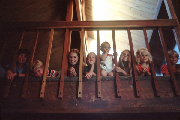 Children Sitting on a Staircase