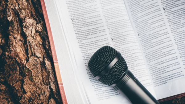 Bible and a microphone