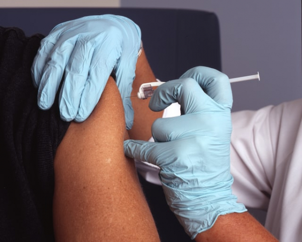 administering a vaccine