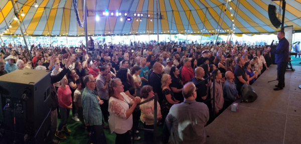 Mario Murillo speaking to a crowd at Modesto, California