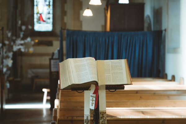 Bible on lectern in Catholic church or chapel