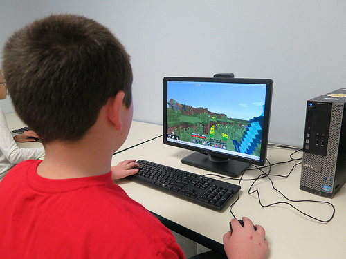 Child playing Minecraft