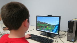 Child playing Minecraft