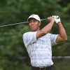 Tiger Woods Drives at Golf Course