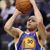 Stephen Curry Shoots Basketball During Match
