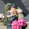 Officer Marc De St. Aubin Hugs His Daughters