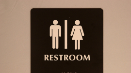 restroom sign showing male and female symbols