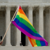 PRIDE flag waving in front of the Supreme Court