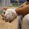 Baseball player's hands in prayer