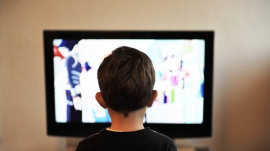Child watching shows on TV