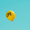 yellow 'Life' printed balloon