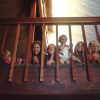 Children Sitting on a Staircase