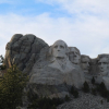 Mount Rushmore features US Presidents George Washington, Thomas Jefferson, Abraham Lincoln and Theodore Roosevelt.