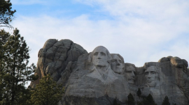 Mount Rushmore features US Presidents George Washington, Thomas Jefferson, Abraham Lincoln and Theodore Roosevelt.