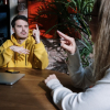two people communicating via sign language