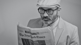 Man reading New York Times