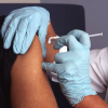 administering a vaccine