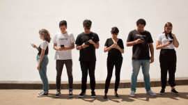 young people with their faces buried on their smartphones