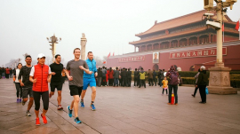 Mark Zuckerberg running through Tiananmen Square in 2016