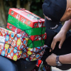 A biker bringing gifts for children at the #BikersWithBoxes event at the Billy Graham Library