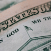 "In God We Trust" motto on a United States dollar bill