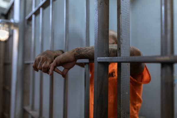 prisoner inside prison cell