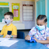 children wearing masks in school