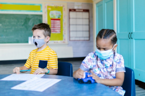 children wearing masks in school